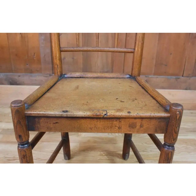 Very beautiful wooden chair from the 19th century in England. Wood is carved and has ornaments. This chair with rustic...