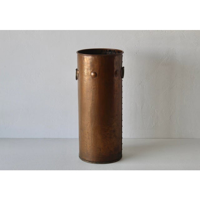 Fabulous Vintage Riveted Cylindrical Copper Umbrella Stand with Brass Hoop Handles in the style of American Arts & Crafts....