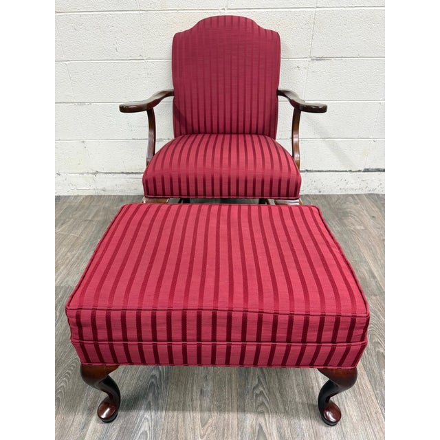 This is a gorgeous classic vintage Ethan Allen Queen Anne Wingback lounge chair with matching ottoman, crafted in North...