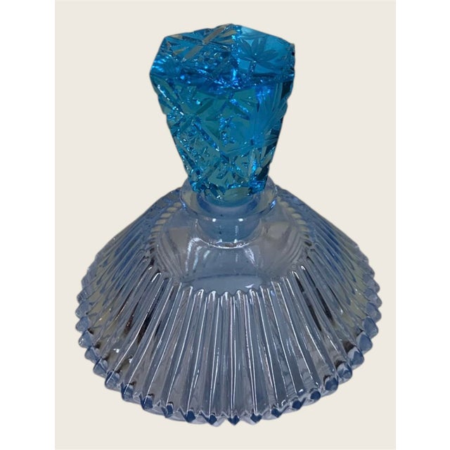 4.5” high, Beautiful Czech Art Deco perfume bottle featuring a stunning ribbed/light blue glass base with aqua blue...