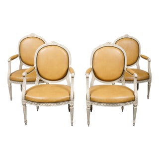 Set of Four French Louis XVI Style 1900s Oval Back Painted and Carved Armchairs For Sale