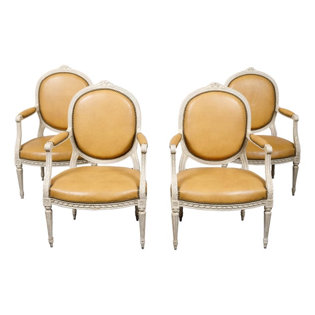 Set of Four French Louis XVI Style 1900s Oval Back Painted and Carved Armchairs For Sale
