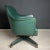 Mid-century swivel green office chair by Umberto Mascagni made in Italy in the 1950s. The vinyl used to create this...