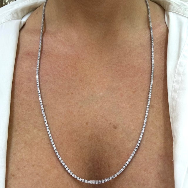 Gender: Ladies Metal Type: 18K White Gold Length: 26.00 inches Width: 2.10 mm Weight: 21.80 grams 18K White Gold single-...