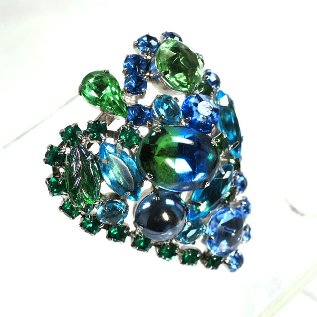 Vintage silver-plated art glass and crystal heart-shaped brooch 1950s. Slightly domed design with a profusion of art glass...