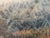 Naturalistic mountain landscape painting by Texas artist Robert W. Boyle. The work features a river running through a...