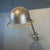 Beautiful original one arm Jielde lamp in green but partly stripped. Designed by the French engineer Jean-Louis Domecq in...