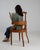 A armchair whose dark mahogany wood, cane/wood seat, turned legs gives it real character at first glance. Originating in...