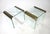 A pair of elegant plateglass and brass side tables from the Pace Collection designed by Leon Rosen whose company was well...