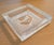 Square crystal cachepot with etched pelican. Great heavy weight as an object on a table or to hold napkins or corral items.