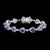 13 Carat Natural Tanzanite & 2.5 Ct Diamond Tennis Bracelet 14 Karat White Gold For Sale - Image 11 of 18