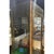 Offered is a rare brass and glass display vitrine cabinet by Mastercraft. These are the harder to find more slender...