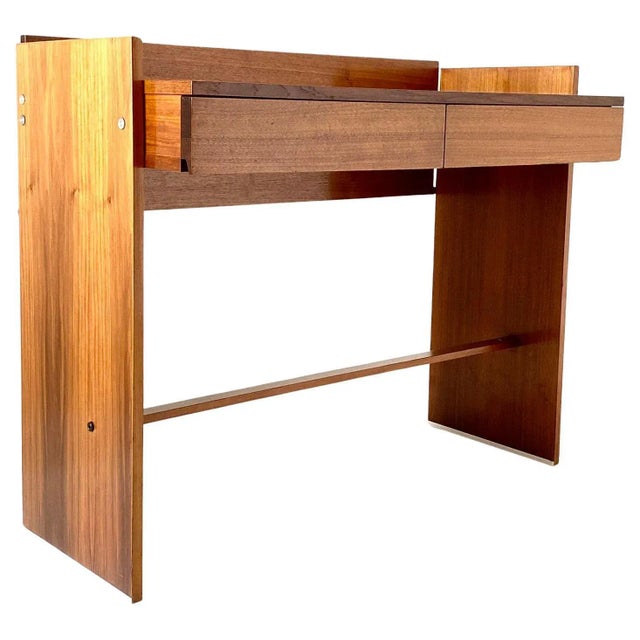 Elegant small desk from the 1970s made of light color solid wood and produced by the iconic Italian company MIM Roma....