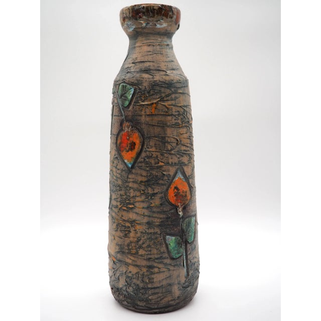 A lovely floorvase in ceramic stoneware , decorated with a beautiful deer and flowers by Eivor Larsson for Tilgmans...