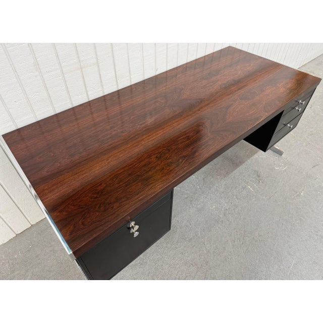 This listing is for a Mid-Century Modern Hugh Acton Style Rosewood Executive Desk. Featuring a straight line design, large...