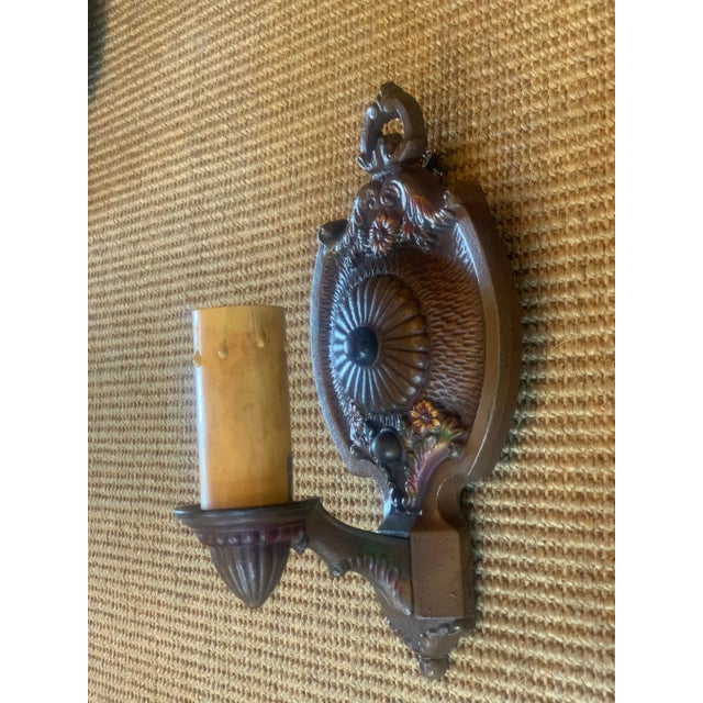 These sconces are just perfect for your home! The polychrome painted flowers make these pieces special for any room in a...