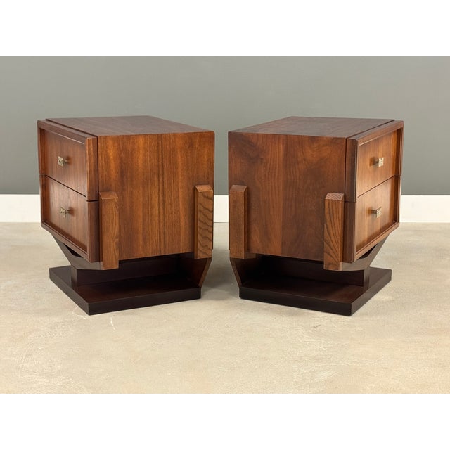 A pair of mid century modern brutalist nightstands in the style of Paul Evans with floating cases and brass knobs....