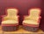 A unique and colorful pair of 19th century French Napoleon III armchairs upholstered in a golden yellow patterned fabric...