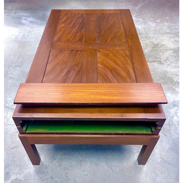 Vintage folding long game coffee table with latch.Table opens to a long game board and closes to a coffee table with...