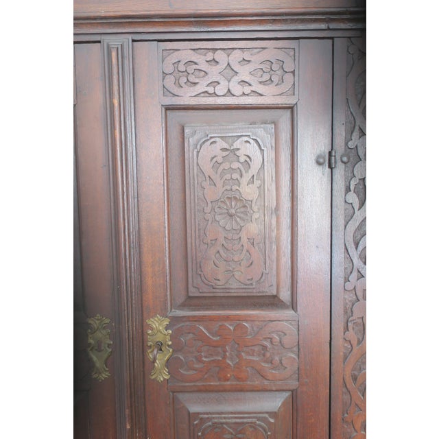 Antique barock carved oak wardrobe dating from about 1780.