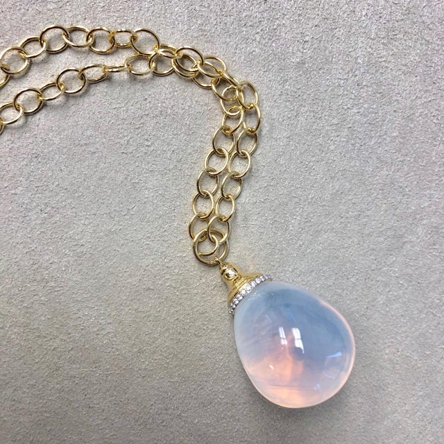 Created in 18 karat yellow gold Moon quartz 50 cts minimum Diamonds 0.14 ct approx Chain sold separately Ask for...