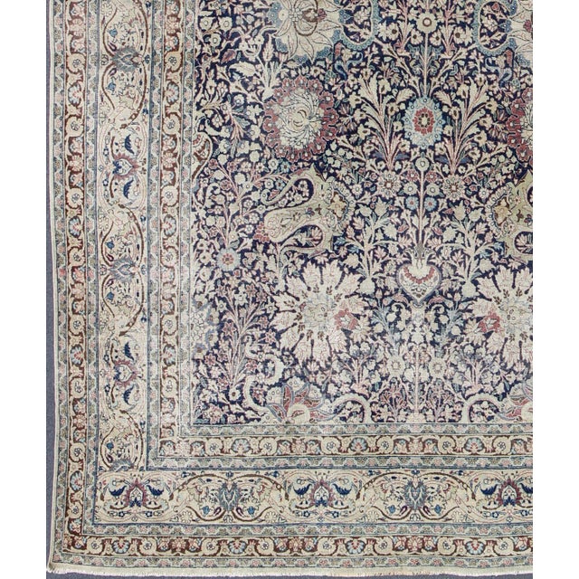 Navy Blue, ivory and multi colors antique Persian Tabriz rug with all-over large scale floral design, rug zir-5, country...