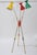 Very rare floor lamp from Stilnovo, Italy. Three enameled shades in primary colors. Adjustable arms and shades. Featuring...