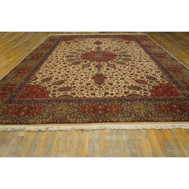 A one-of-a-kind antique Tabriz rug, The piece measures approximately 11’7″ × 16’6″ (per the seller listing) — a generous...