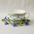 Elegant Raynaud Limoges "Allée Royale" porcelain teacup, introduced in 2005 and crafted in Limoges, France, a region...