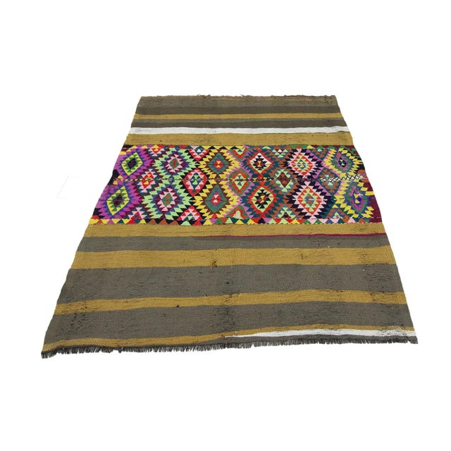 Decorative vintage handwoven kilim rug from Marash region of Turkey.Approximately 50-60 years old. In very good condition.