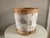 This large cylindrical shape wastebasket is made of birchbark in shades of white, gray, beige and brown. Contrasting brown...