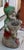 Large cast stone garden gnome double planter, English, mid-20th century. Seated, cross-legged gnome holding a little...