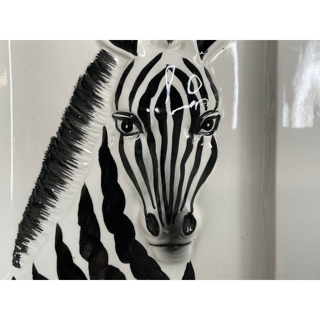 Vintage hand painted Zebra wall plaque with black border. From 1975, zebra is in 3 dimensional relief with black ears and...