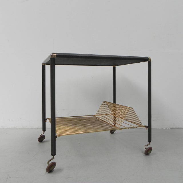 Height: 53 cm. Width: 54 cm. Depth: 44 cm. Origin: France, 1960s. Material: steel / mahogany / brass.