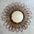 1950s rattan sunburst mirror. The mirror is original. Made in the south of France. Very good overall condition