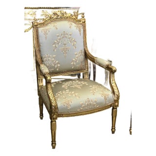 French Louis XVI-Inspired Armchair – Beige Damask Upholstery With Ornate Gold Leaf Frame For Sale