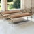A pair of French Louis XVI painted and parcel gilt benches, graceful and refined, with their original antique white finish...