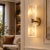 Bring warm, diffused light and natural stone character to your interior with this pair of handcrafted brass and natural...