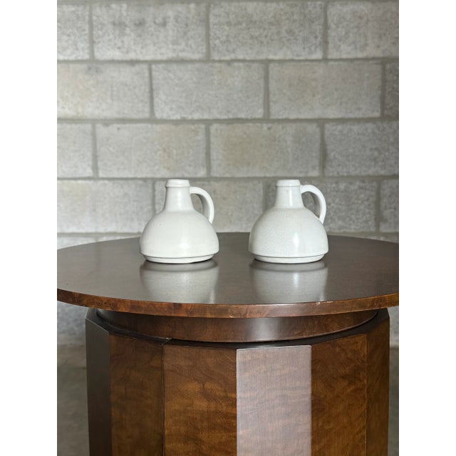 A pair of wonderful vases produced by Nittsjö. Great classic form vases with minimalist palette would allow for use in a...