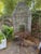 A spectacular, monumental 77-inch tall custom artisan birdcage on a matching scrolled stand. Standing nearly six and a...