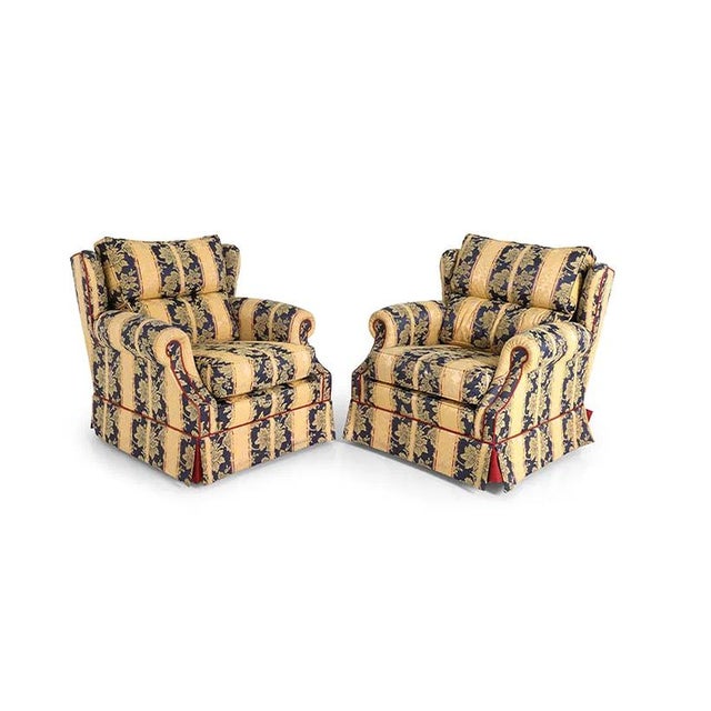 A visually stunning fabric by Peter Guild Upholstery on a very fine pair (2) rolled arm traditional English lounge chairs....
