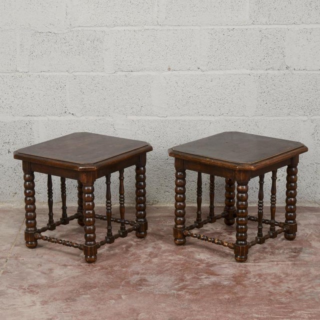 This pair of carved and turned wooden stools dates back to the late 19th century, perfectly reflecting the eclectic taste...