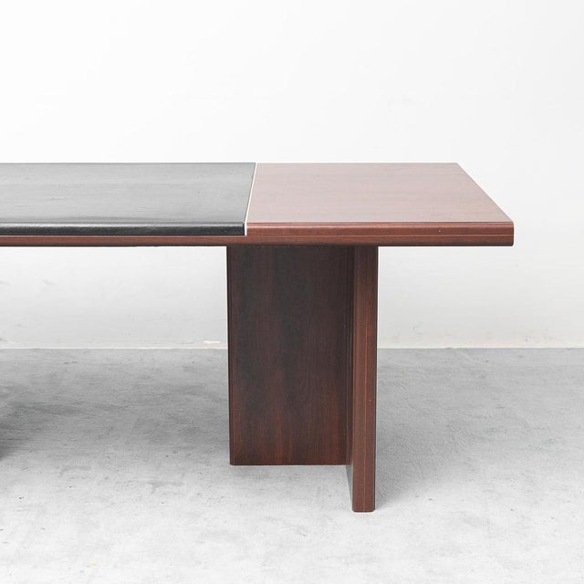 Rectangular desk. Wooden frame and base with black faux leather top. Made in the 1970s. Excellent condition. Some signs of...