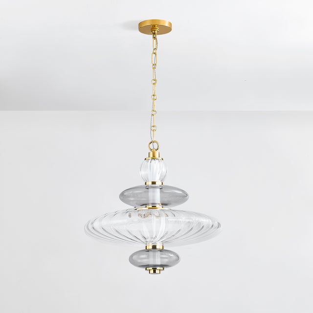 Old meets new in the nostalgic Williams pendant. Streamlined renditions of classic glass techniques are stacked to create...