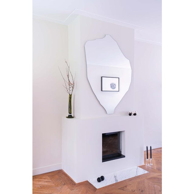 Transform your space with a Pon Design mirror, a blend of historical elegance and modern artistry that captivates with its...