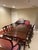 Authentic Maitland-Smith dining set consisting of a mahogany dining table with leaf extension, six matching Maitland-Smith...
