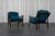 Pair of mid-century Scandinavian teak armchairs, newly upholstered and covered in a petrol blue corduroy by the British...