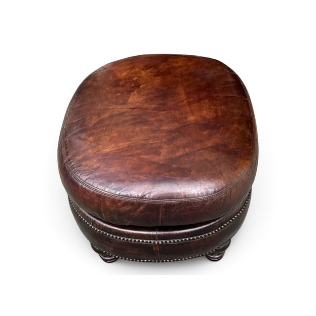 Vintage Oval Brown Leather Ottoman With Brass Nailhead Trim and Carved Wood Feet For Sale In Los Angeles - Image 6 of 9