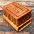 This exquisite vintage marquetry box is a testament to the meticulous art of wood inlay, showcasing a sophisticated blend...