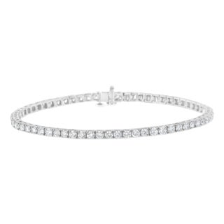 IGI Certified 7.0 Cttw Diamond 14K White Gold Classic 7â€ Tennis Bracelet (H-I Color, I1-I2 Clarity) For Sale